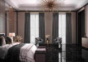 Fliesendorf zeigt ein luxuriöses Schlafzimmer mit glänzender Bodenfliese in schwarz-goldener Marmoroptik.