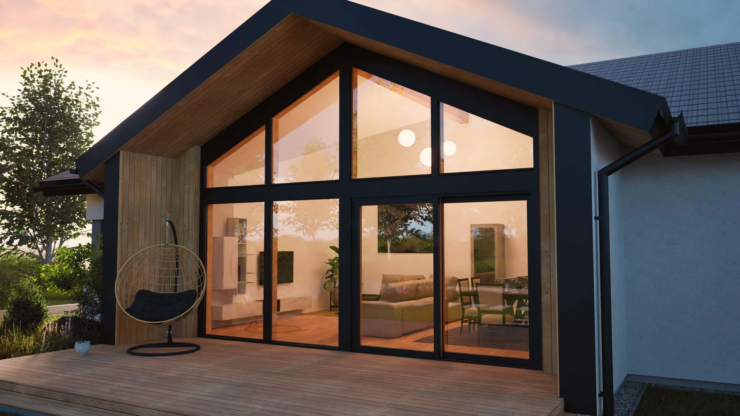 HARTL HAUS zeigt einen eindrucksvollen Bungalow mit Zwerchdach, Wandverglasung mit Terrassenschiebetüren und schwarzem Alurahmen, Fassadenelementen aus Holz und einem Terrassenpodest mit Holzdielen.