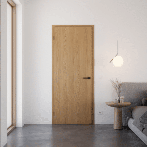 Ein minimalistisches, erdgebundenes Schlafzimmer mit Sichtestrich, bodentiefem Glasfenster, Bett mit Beistelltisch, einer kunstvoll-reduzierten Pendelleuchte und einer Eichenholztür mit passendem Türrahmen und modernem Türgriff in Schwarz von WIENTÜR91.
