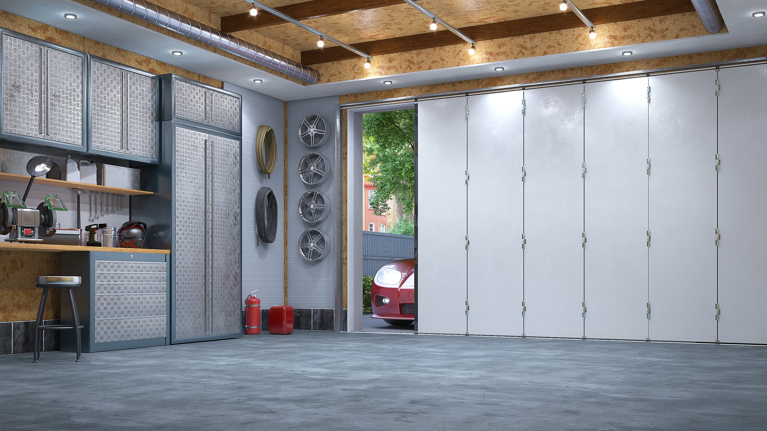 Innenansicht einer modernen Garage mit praktischem Seiten-Sektionaltor, dass sich gerade öffnet, damit ein Auto in die Garage fahren kann.